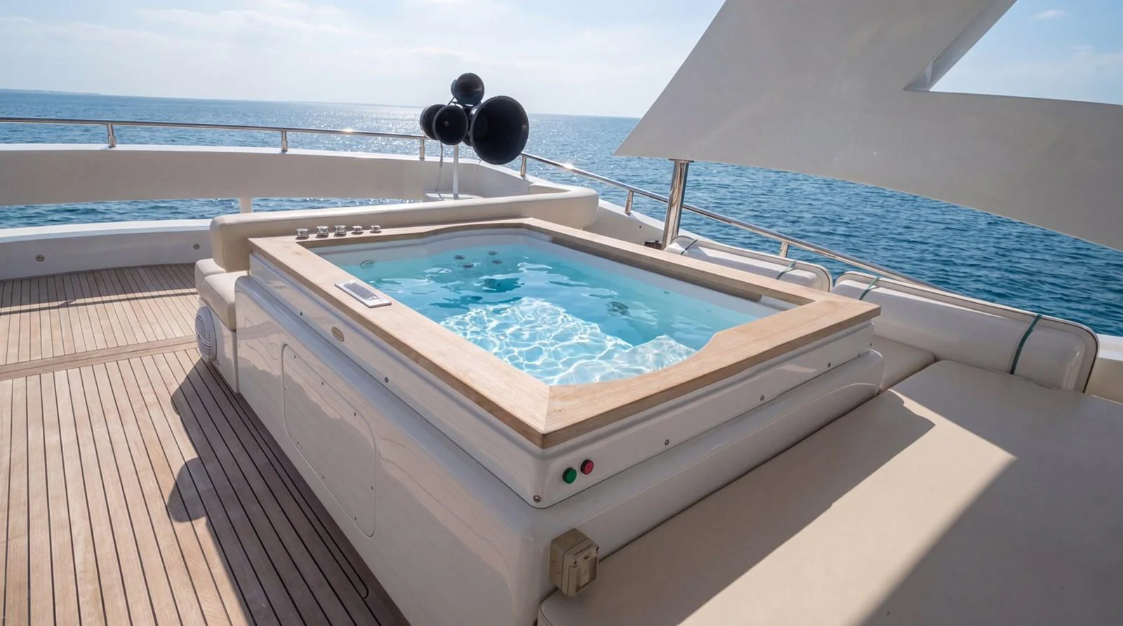The sundeck features a luxurious jacuzzi with stunning ocean views. aboard TAYGET Yacht for Sale