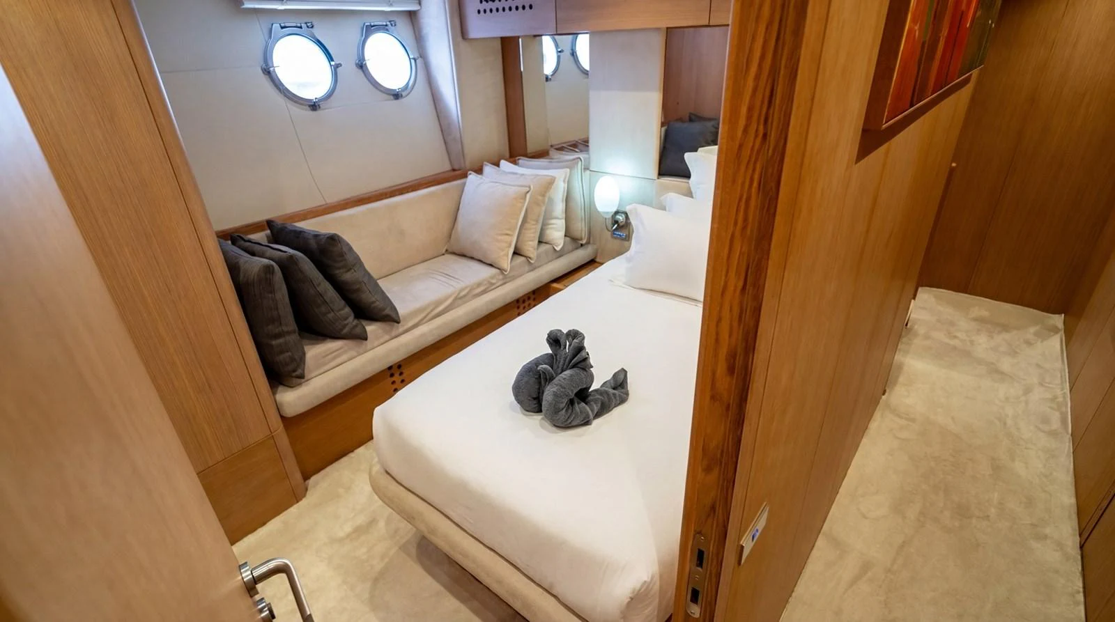 A cozy stateroom with a comfortable bed and elegant decor. aboard TAYGET Yacht for Sale