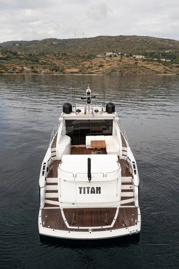 The yacht's aft deck offers a spacious and inviting area for relaxation and entertainment. aboard M/Y TITAN Yacht for Sale