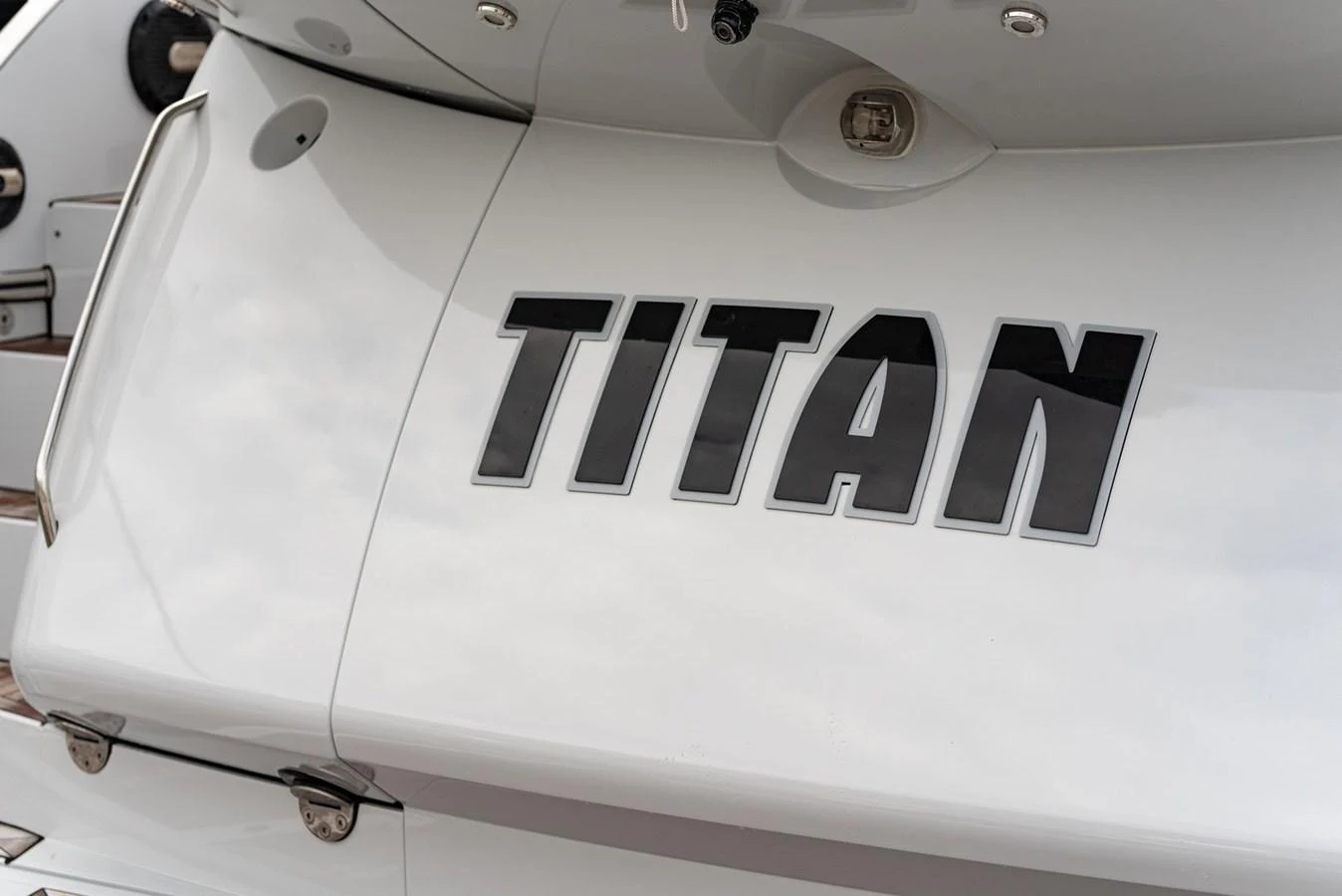 A close-up view of the yacht's name displayed on its stern. aboard M/Y TITAN Yacht for Sale