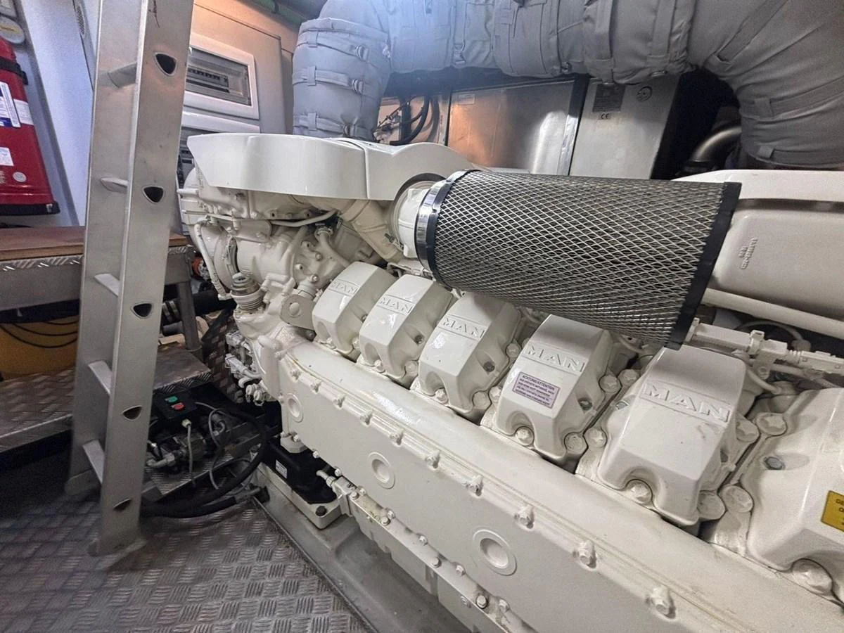 The image showcases the yacht's powerful engine room, highlighting the advanced machinery and engineering. aboard M/Y TITAN Yacht for Sale