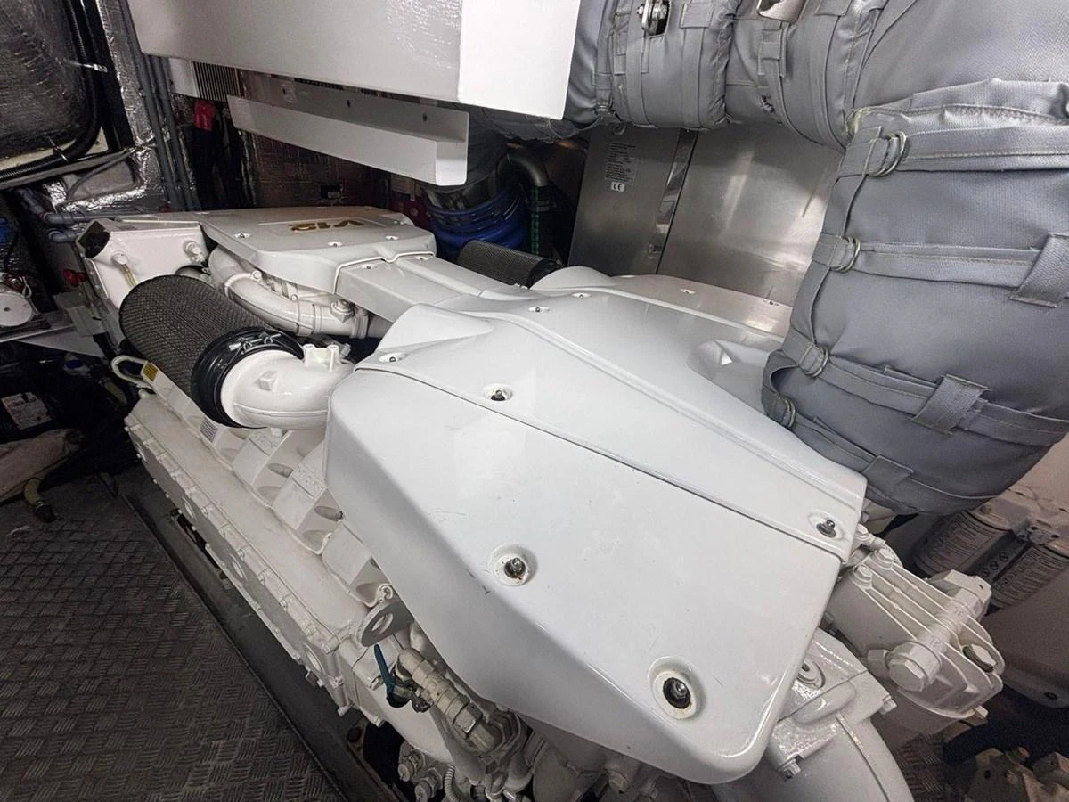 The image showcases the pristine and well-maintained engine room of the yacht. aboard M/Y TITAN Yacht for Sale