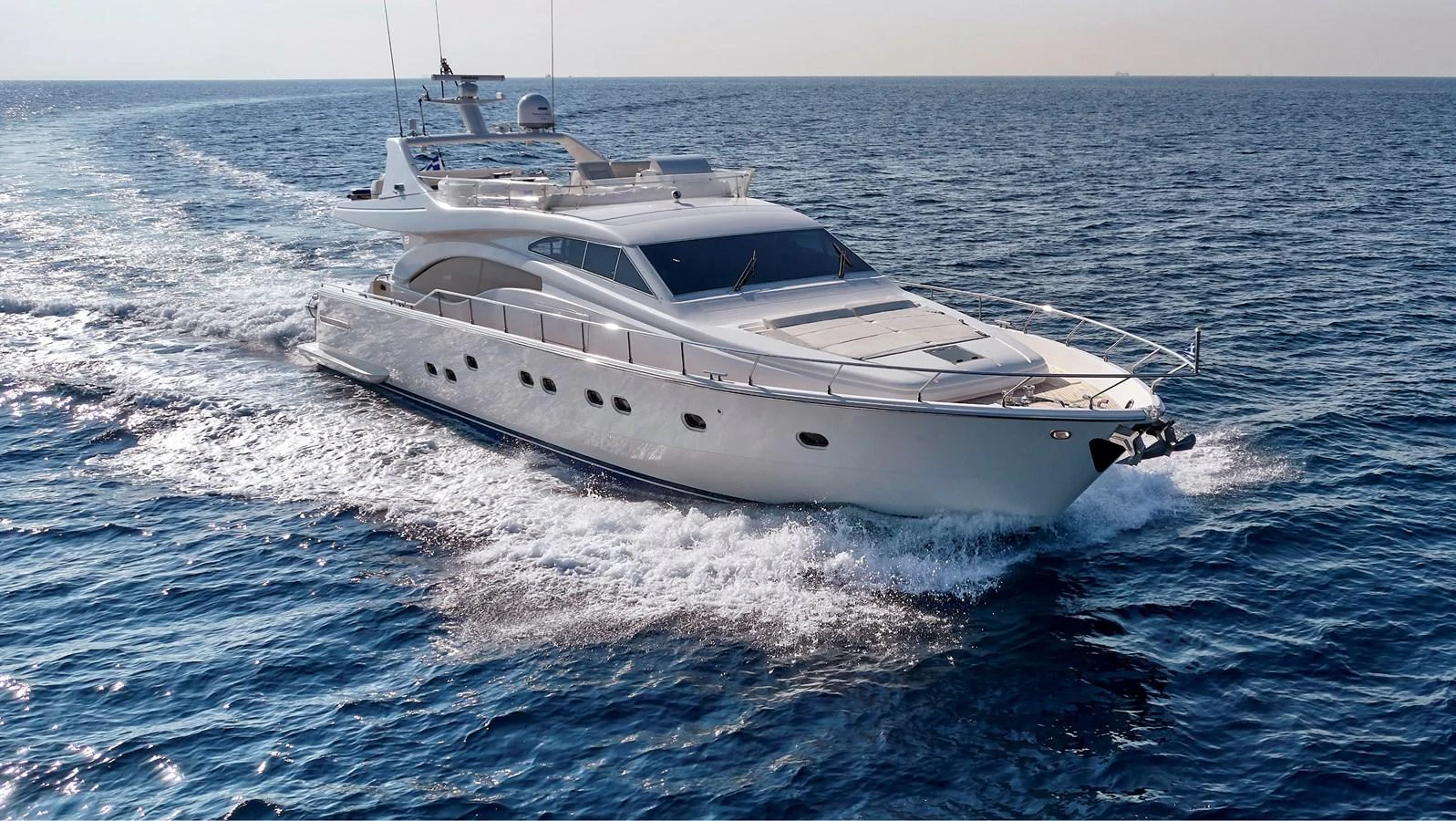 a white yacht in the water aboard MIREN Yacht for Sale