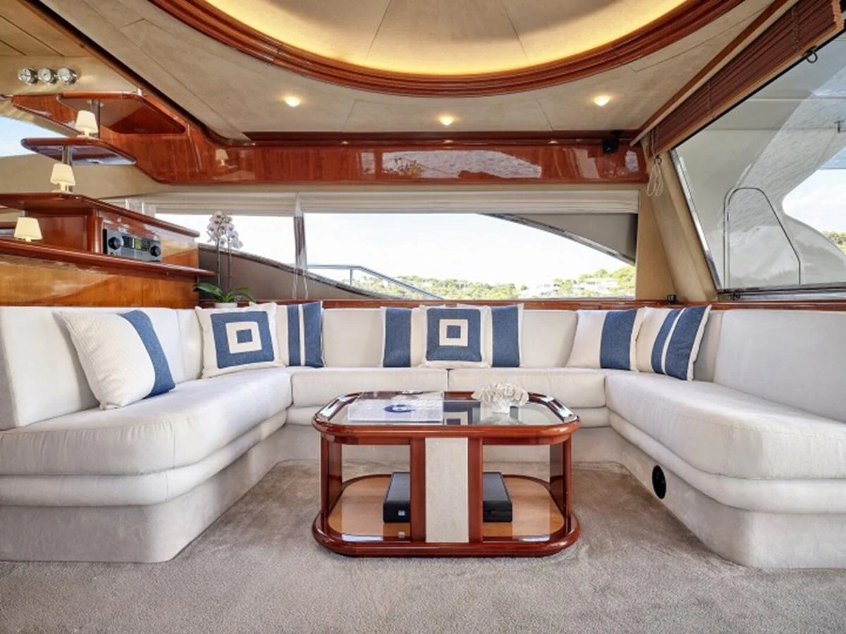 a living room with a large window aboard MIREN Yacht for Sale