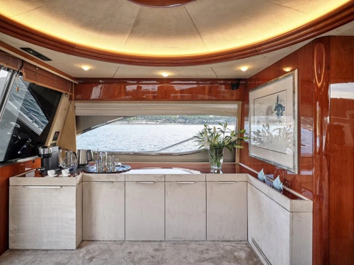 a kitchen with a large window aboard MIREN Yacht for Sale