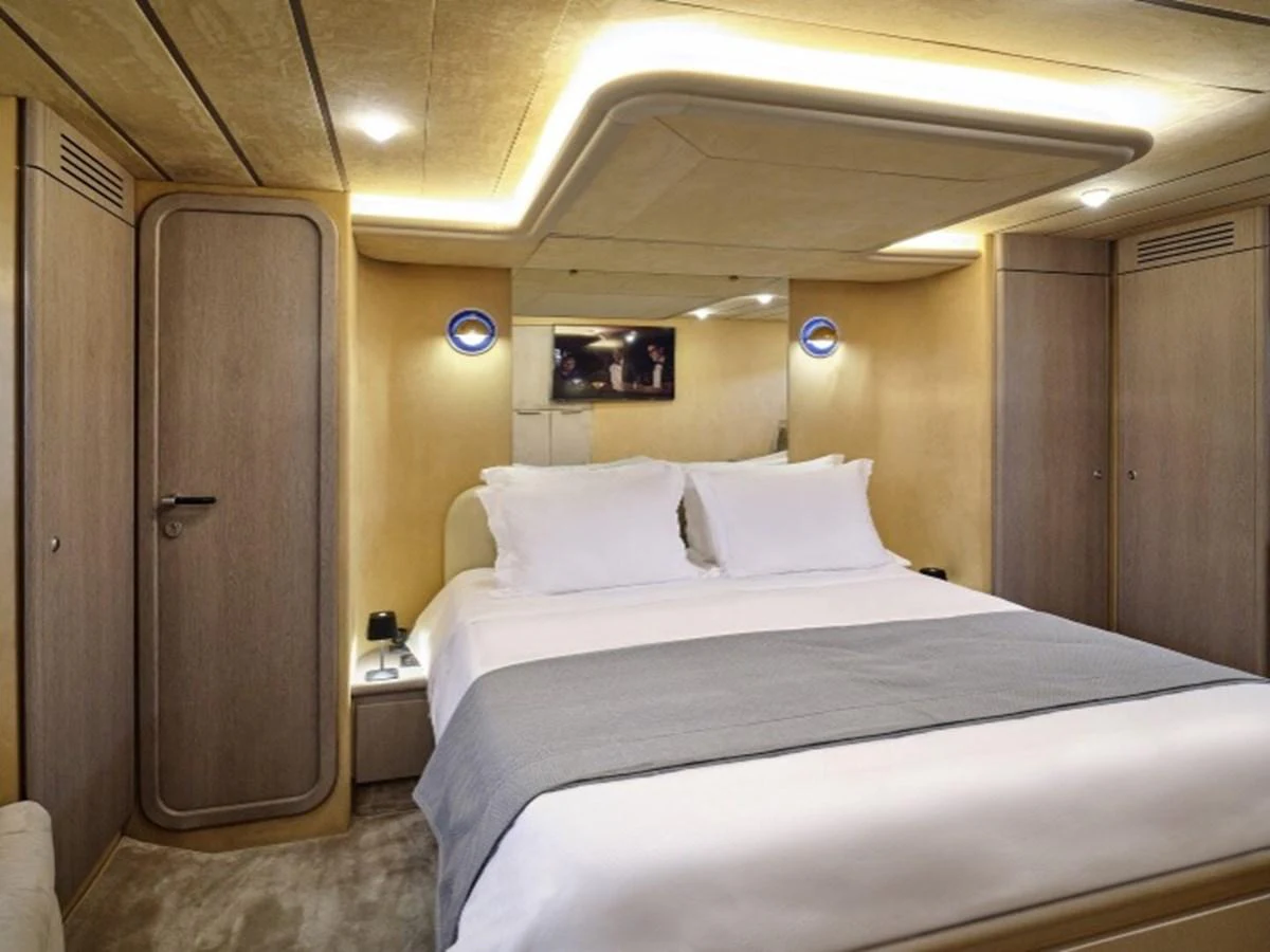 a bed in a room aboard MIREN Yacht for Sale