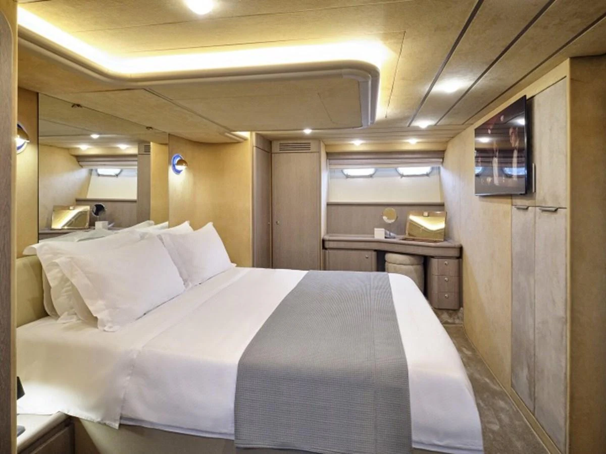 a bed in a room aboard MIREN Yacht for Sale