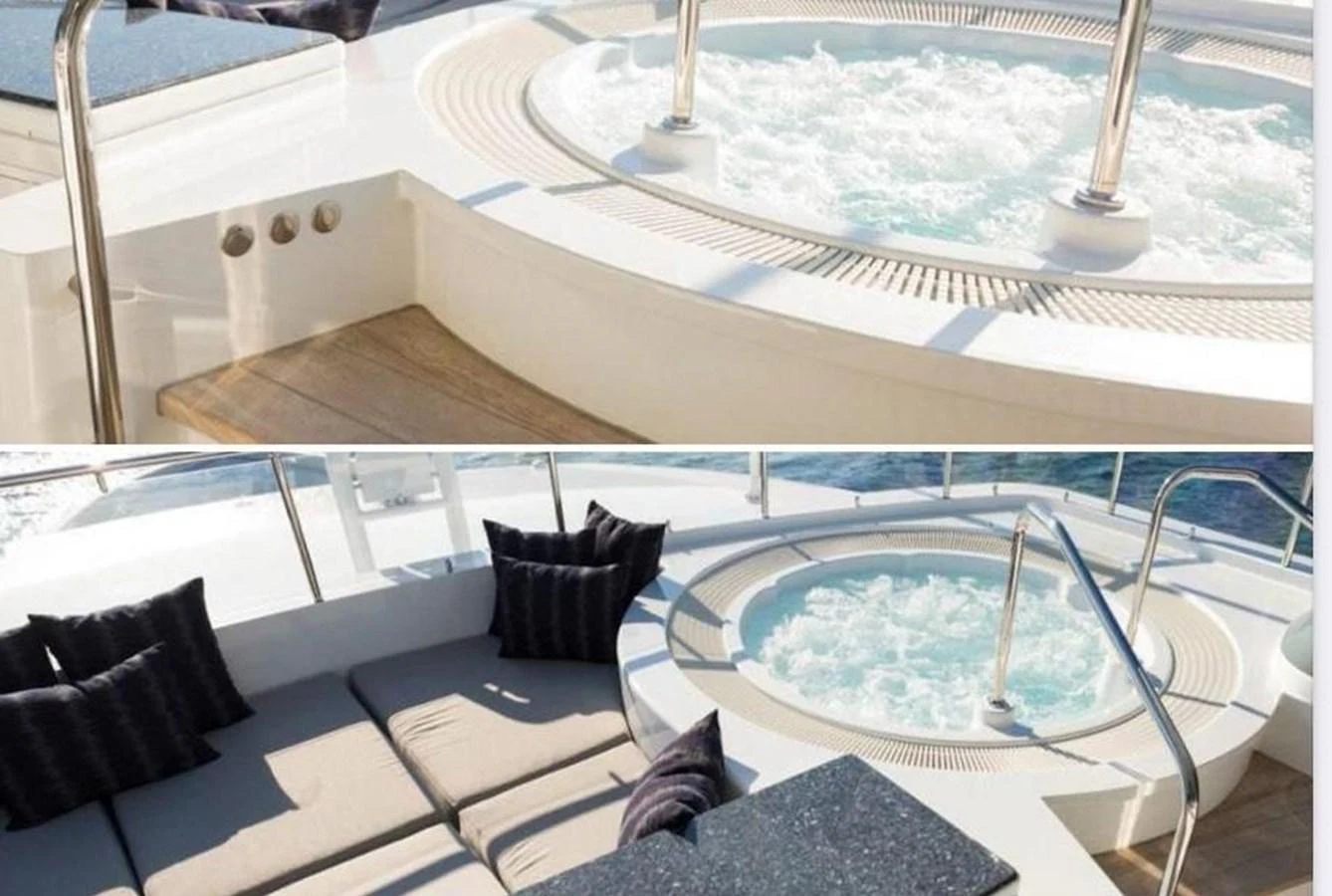 The yacht features a luxurious jacuzzi area with comfortable seating and elegant design. aboard PRINCESS TOO Yacht for Sale