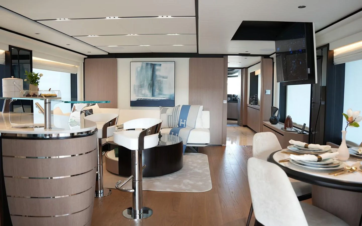 The yacht's salon features a modern and elegant design with comfortable seating and stylish decor. aboard GEULUNEL Yacht for Sale