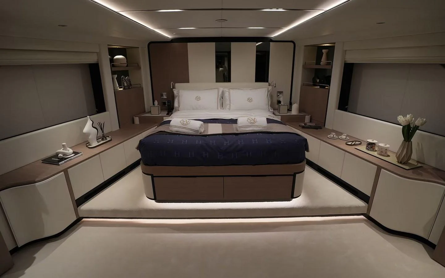 The master stateroom features a luxurious bed with elegant decor and ample storage space. aboard GEULUNEL Yacht for Sale
