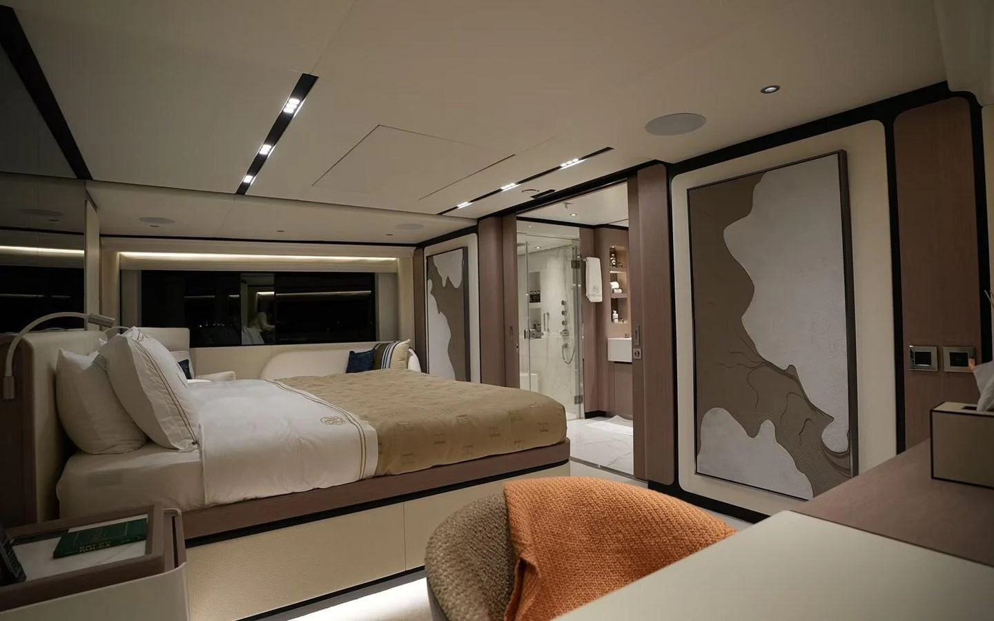 The master stateroom exudes luxury with its spacious layout and elegant design. aboard GEULUNEL Yacht for Sale