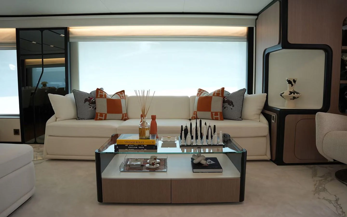 The salon features a stylish and comfortable seating area with modern decor. aboard GEULUNEL Yacht for Sale