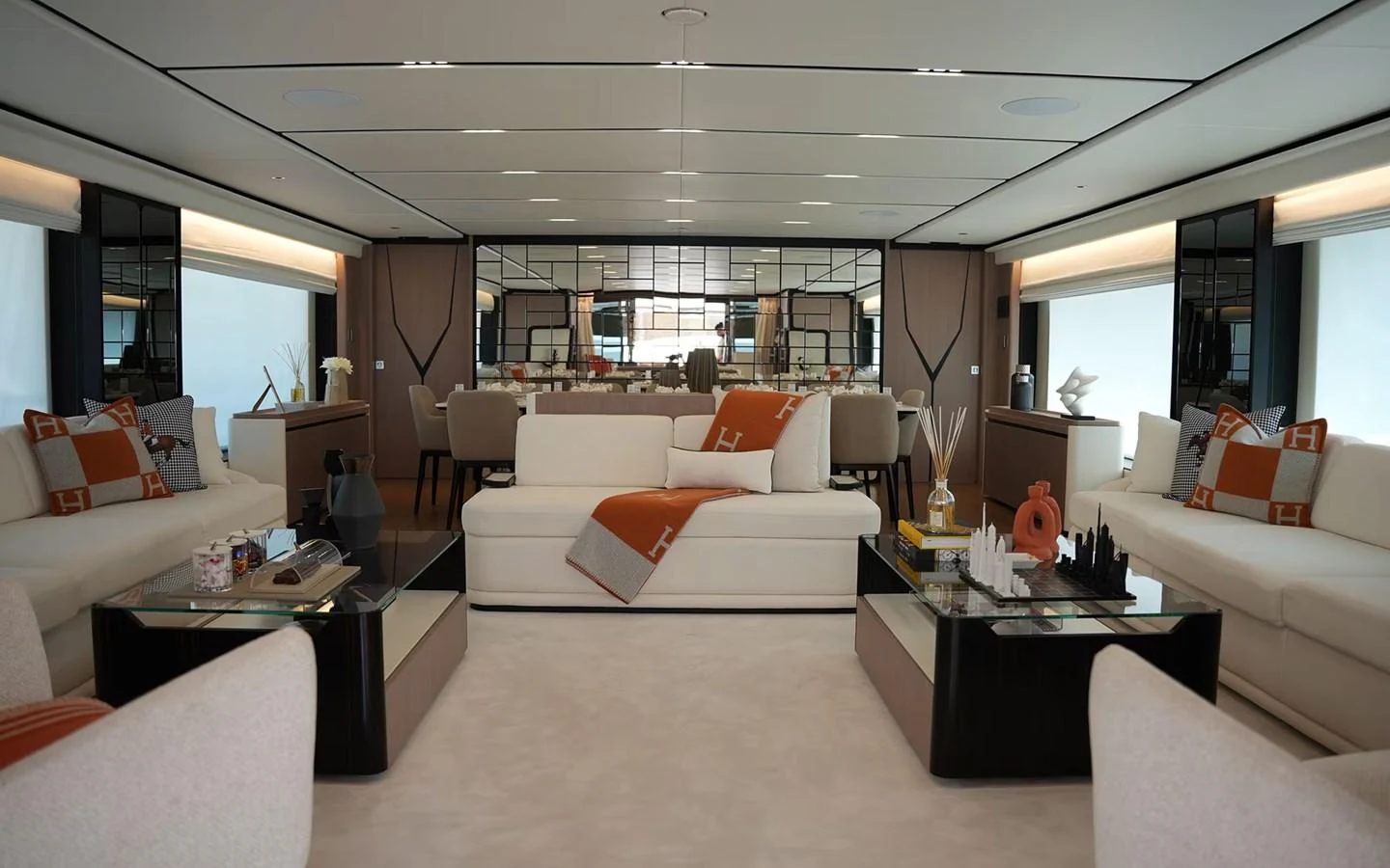 The salon features luxurious seating with elegant decor and ample natural light. aboard GEULUNEL Yacht for Sale