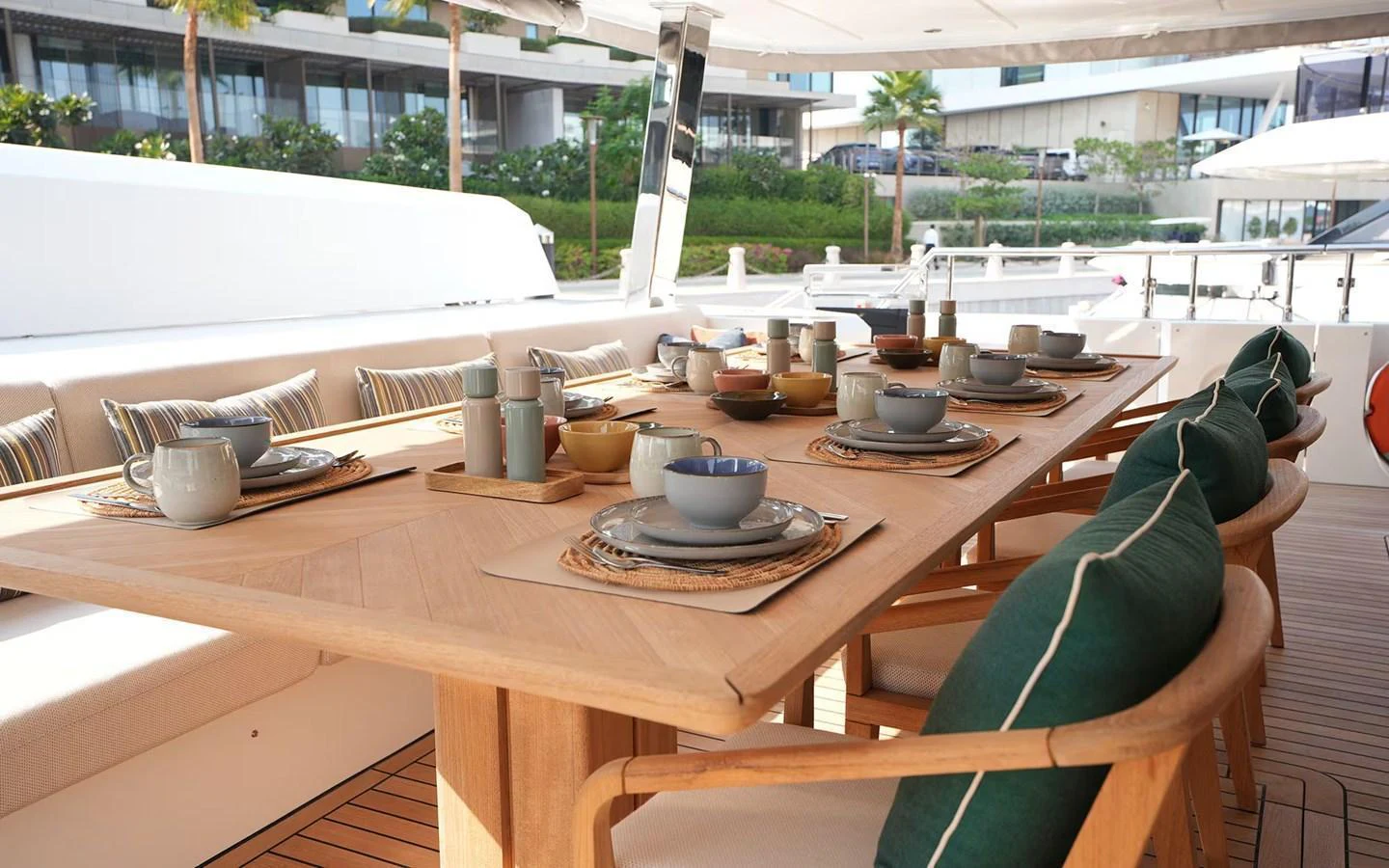 An elegant alfresco dining area set for a meal, showcasing comfort and style. aboard GEULUNEL Yacht for Sale