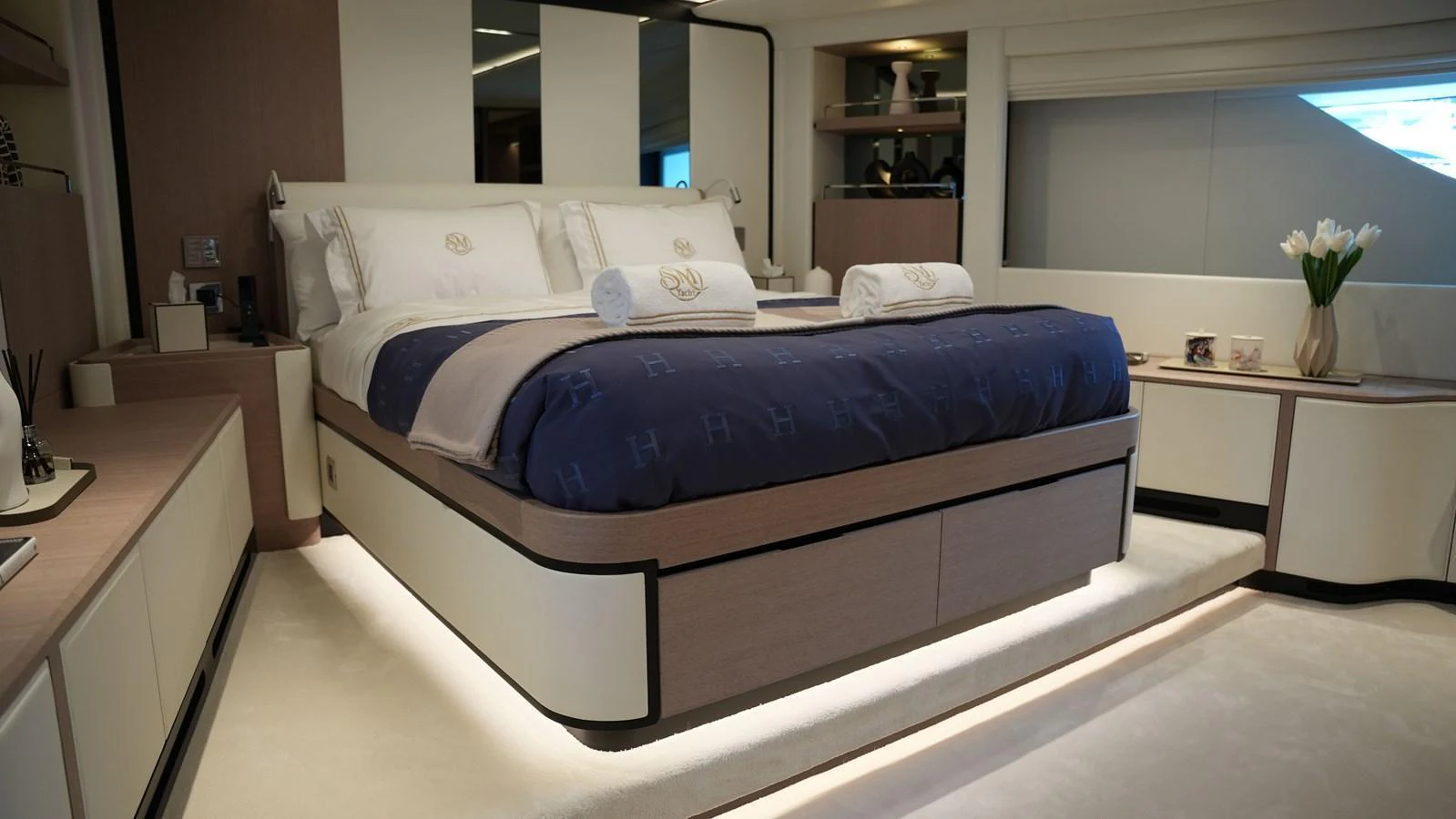 The master stateroom offers a luxurious and serene retreat with elegant bedding and modern furnishings. aboard GEULUNEL Yacht for Sale