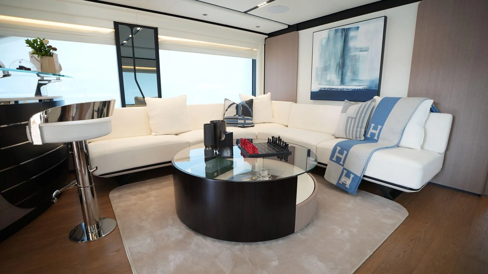The salon features a modern and elegant design with plush seating and stylish decor. aboard GEULUNEL Yacht for Sale