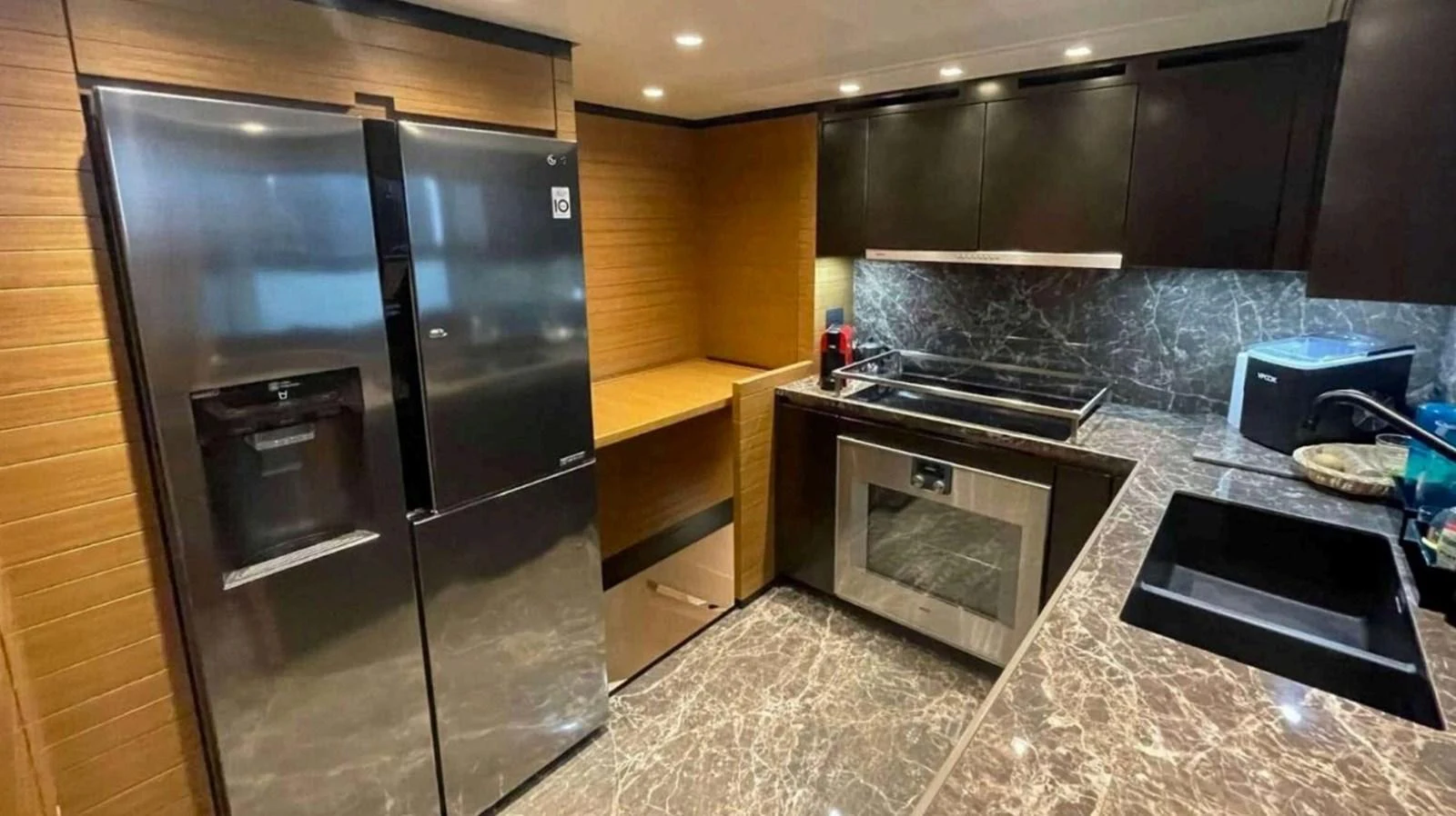 The galley features modern appliances and sleek countertops, perfect for gourmet cooking at sea. aboard SOLEDO Yacht for Sale