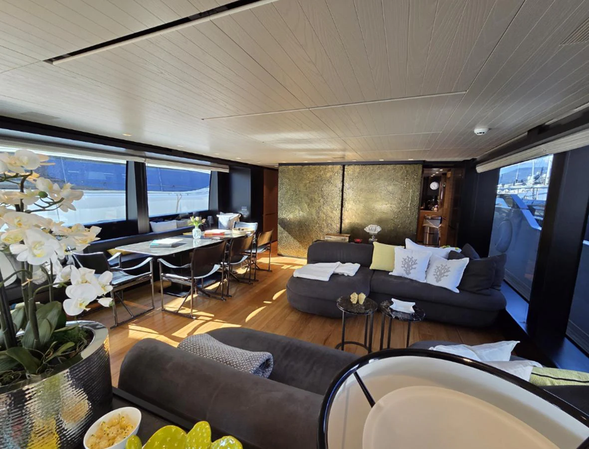 The yacht's salon features a spacious and elegantly designed seating area with modern furnishings and ample natural light. aboard SOLEDO Yacht for Sale