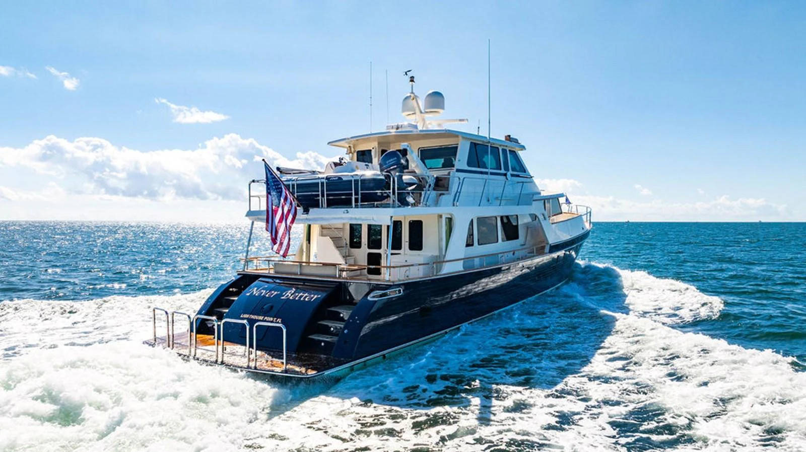 a boat on the water aboard NEVER BETTER Yacht for Sale