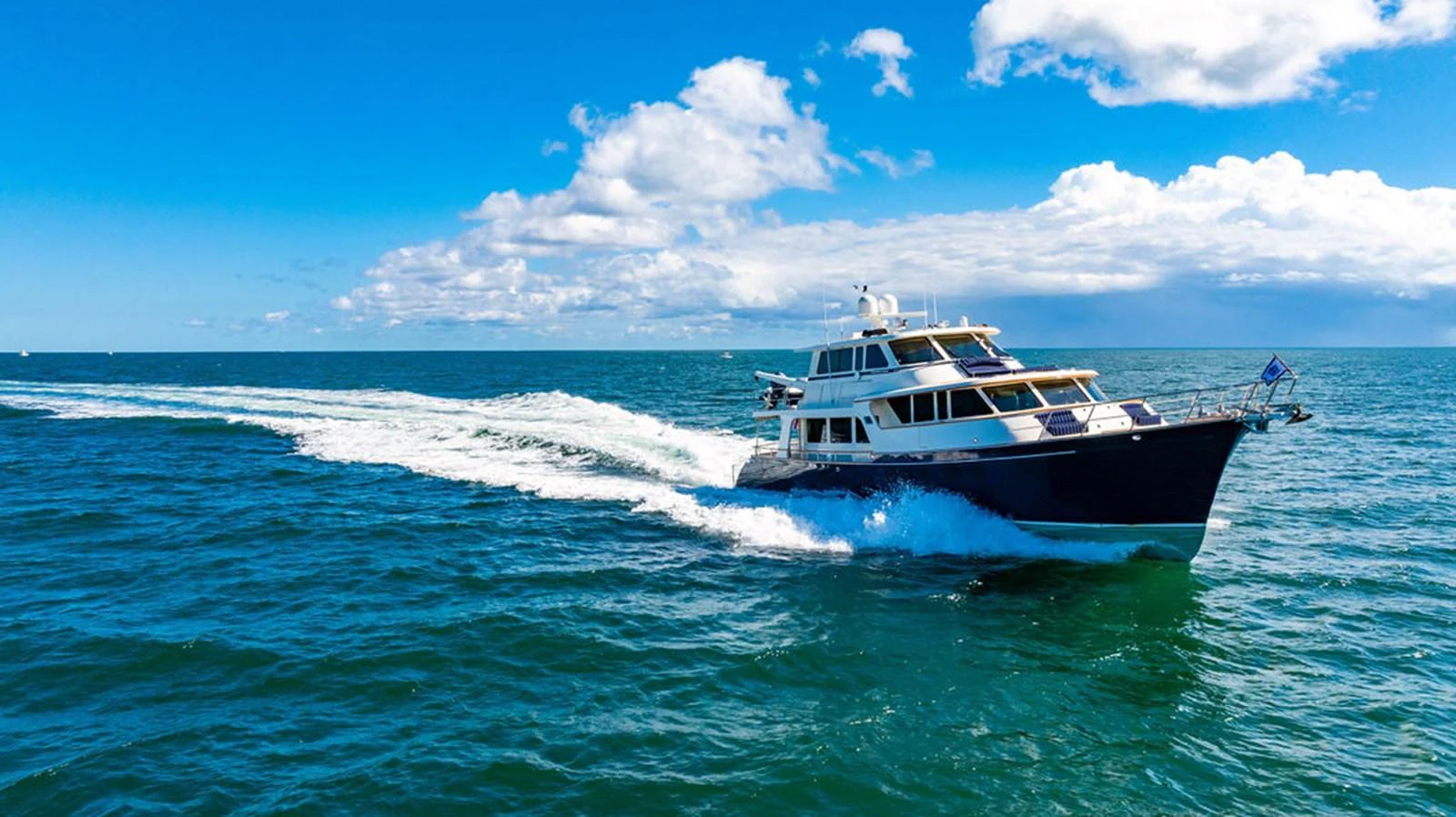 a boat on the water aboard NEVER BETTER Yacht for Sale