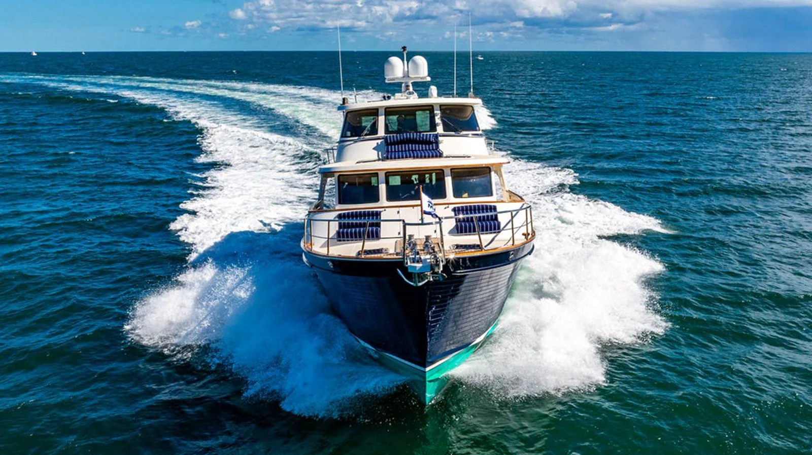 a boat on the water aboard NEVER BETTER Yacht for Sale