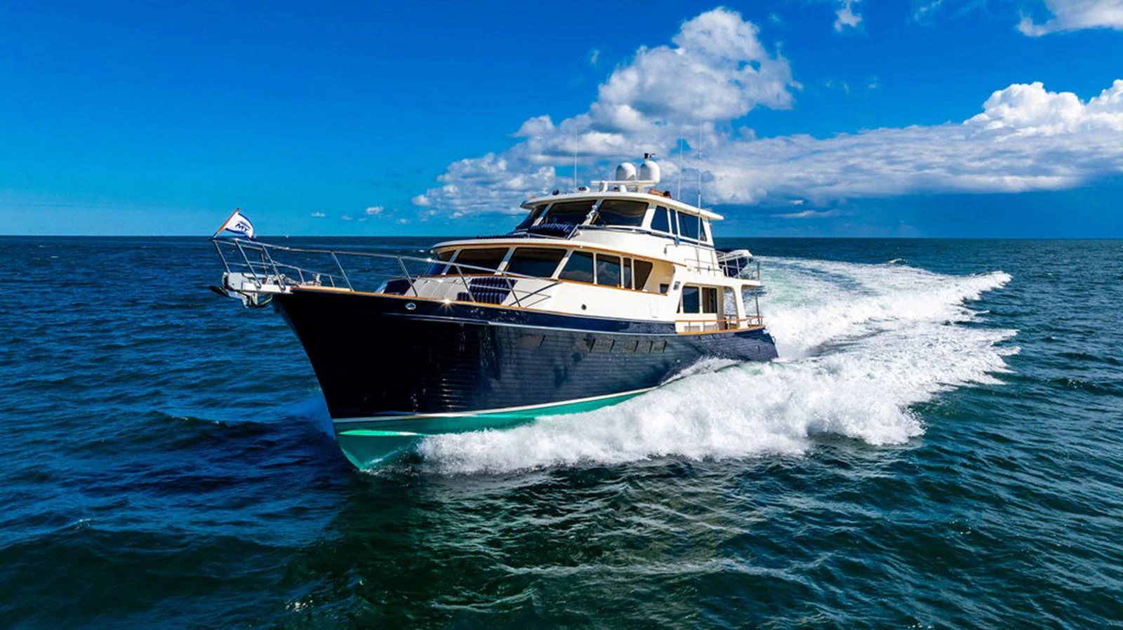 a boat on the water aboard NEVER BETTER Yacht for Sale