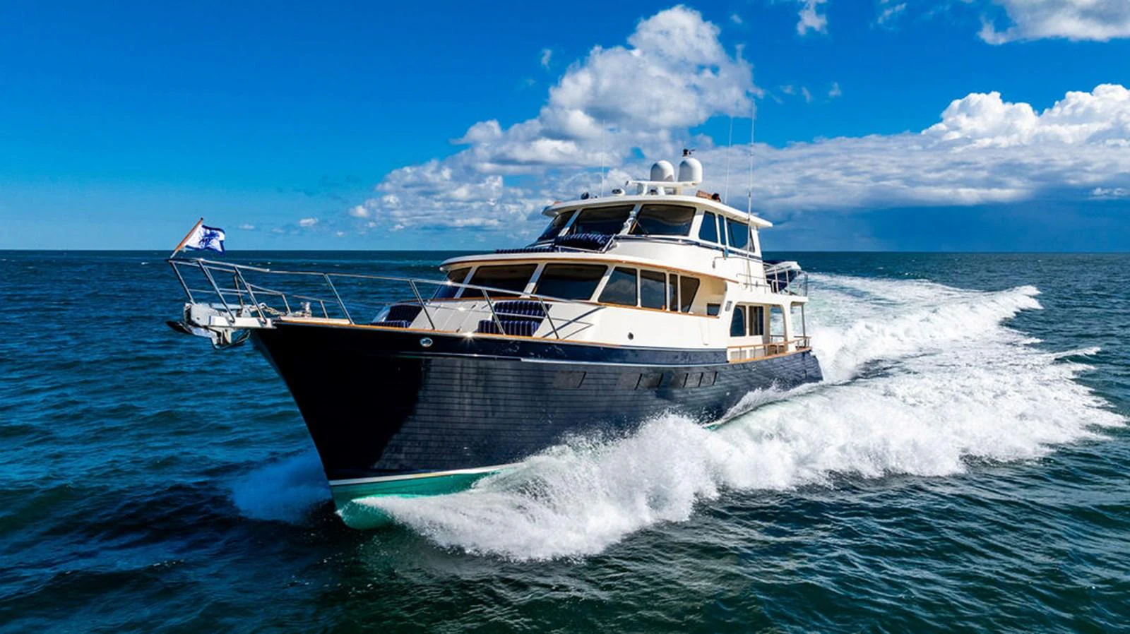 a boat on the water aboard NEVER BETTER Yacht for Sale