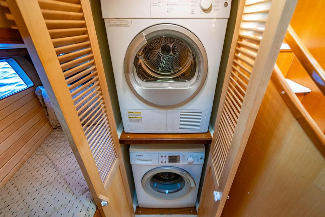 a washing machine in a room aboard NEVER BETTER Yacht for Sale