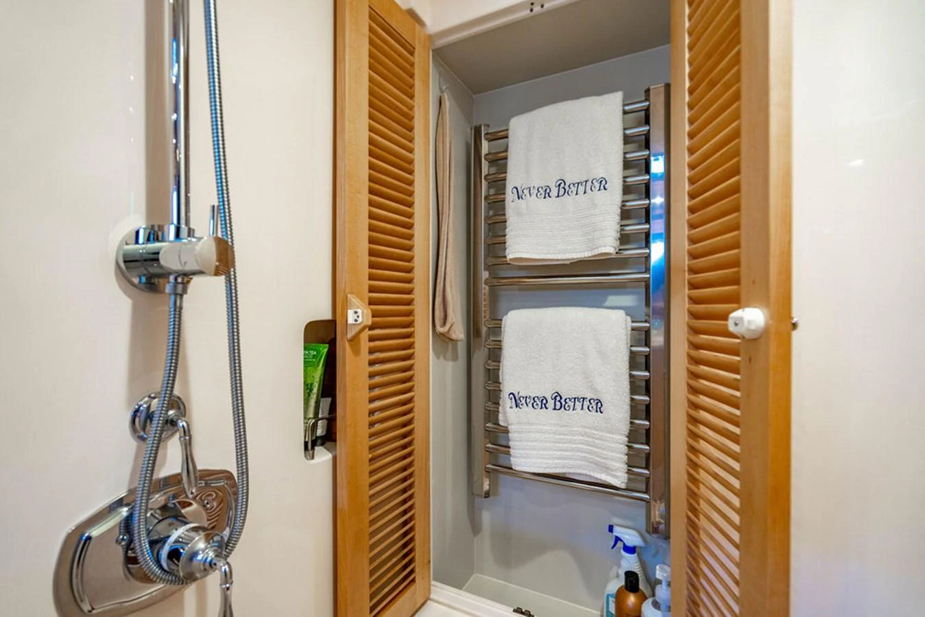 a bathroom with a sink and a mirror aboard NEVER BETTER Yacht for Sale