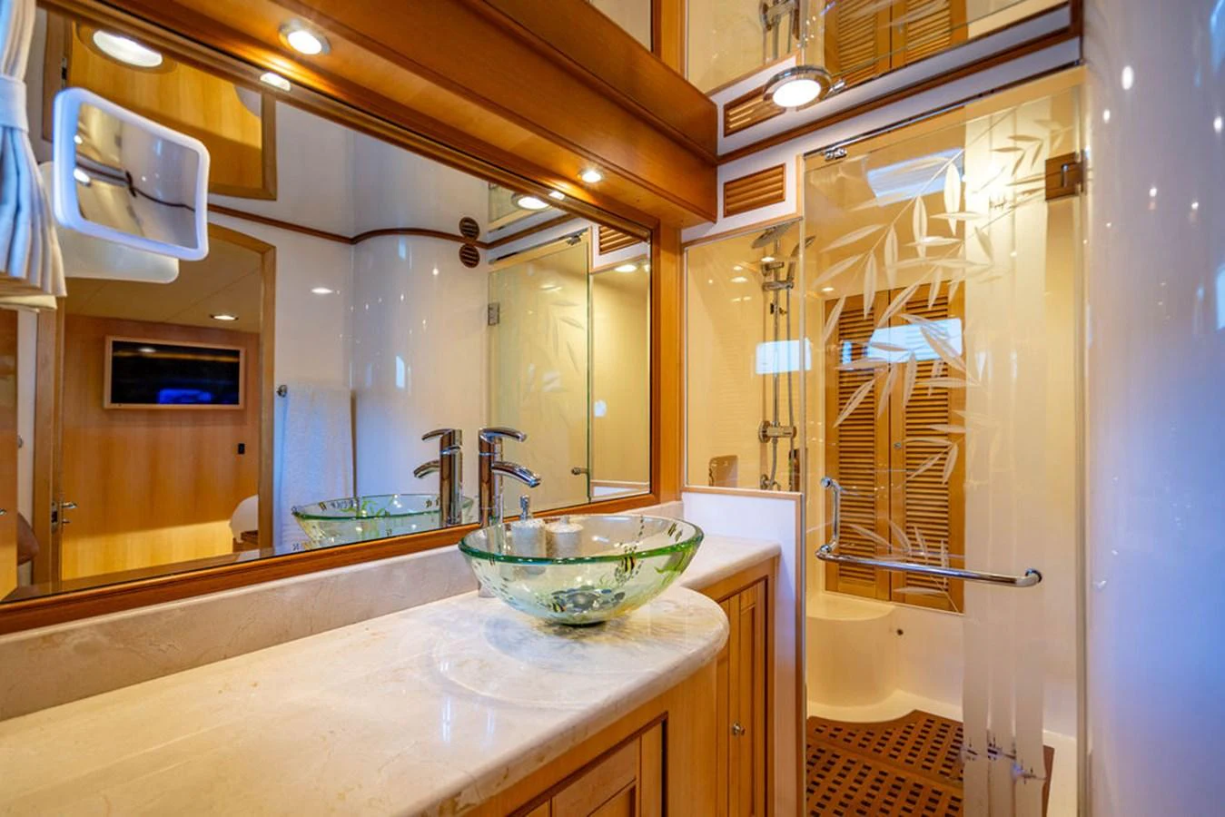 a bathroom with a sink and a mirror aboard NEVER BETTER Yacht for Sale