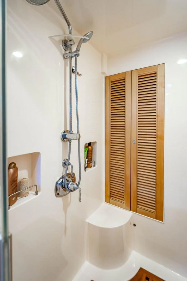a shower with a glass door aboard NEVER BETTER Yacht for Sale