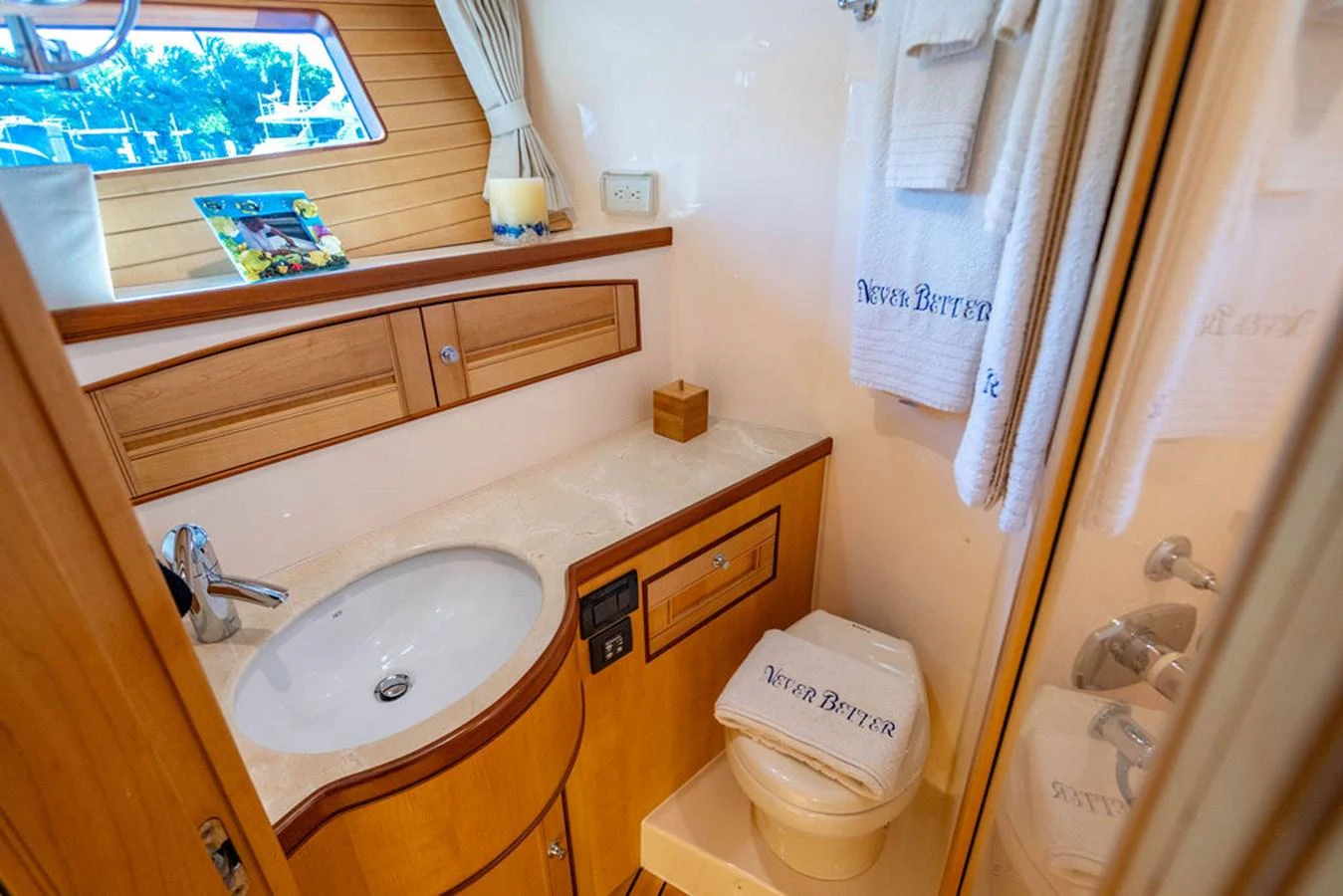 a bathroom with a sink and toilet aboard NEVER BETTER Yacht for Sale
