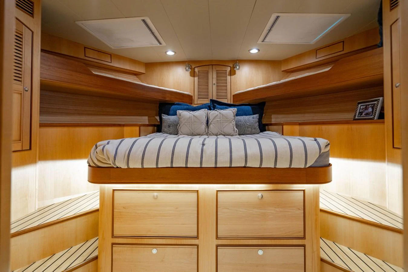 a bed in a room aboard NEVER BETTER Yacht for Sale