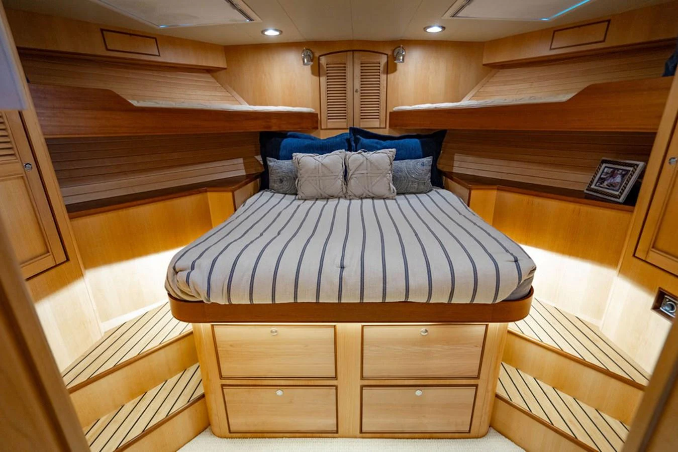 a bed in a room aboard NEVER BETTER Yacht for Sale