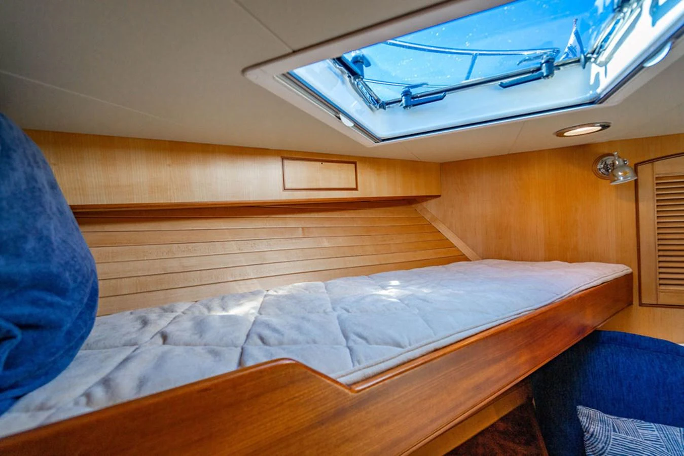 a bed in a room aboard NEVER BETTER Yacht for Sale