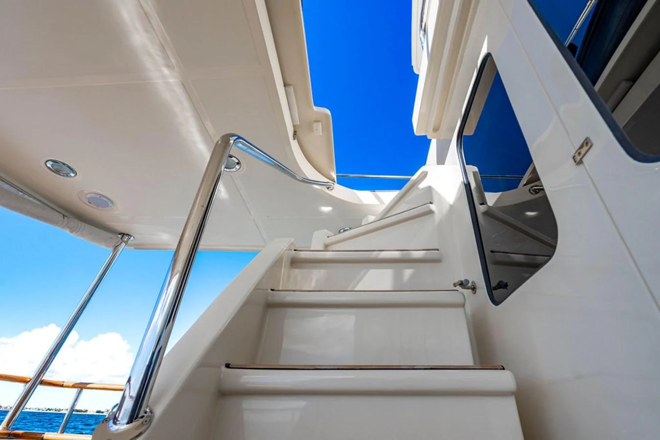 looking up at the sky from the bottom of a plane aboard NEVER BETTER Yacht for Sale