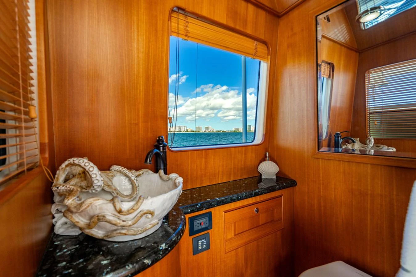 a room with a statue aboard NEVER BETTER Yacht for Sale