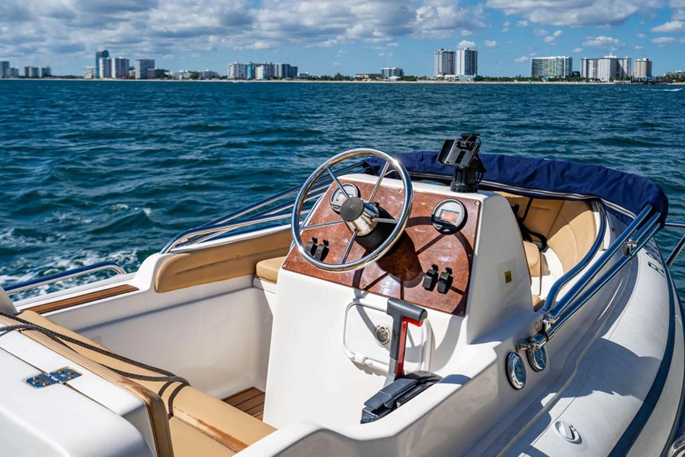 a person driving a boat aboard NEVER BETTER Yacht for Sale