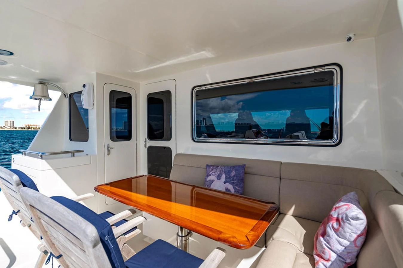 a boat with a tv on the wall aboard NEVER BETTER Yacht for Sale