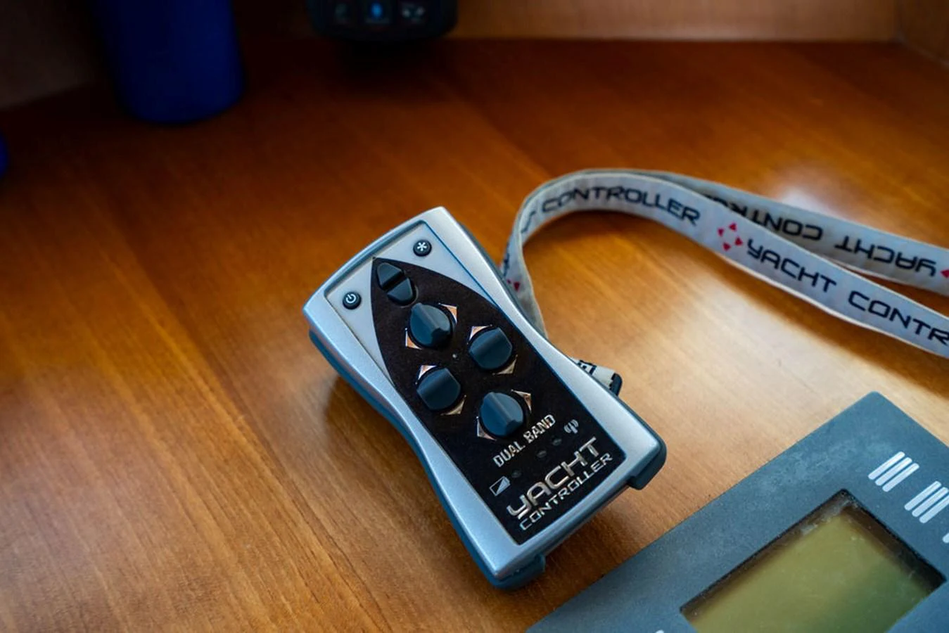 a remote control on a table aboard NEVER BETTER Yacht for Sale