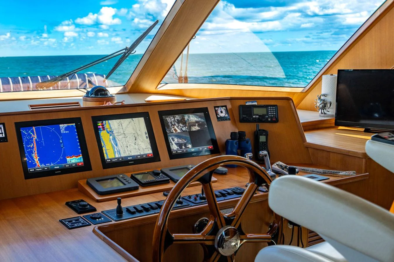 a control room with multiple monitors aboard NEVER BETTER Yacht for Sale