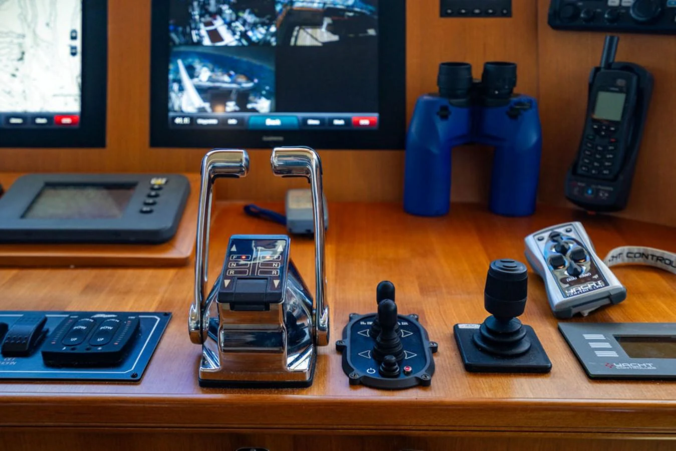 a table with a game controller and game controllers aboard NEVER BETTER Yacht for Sale