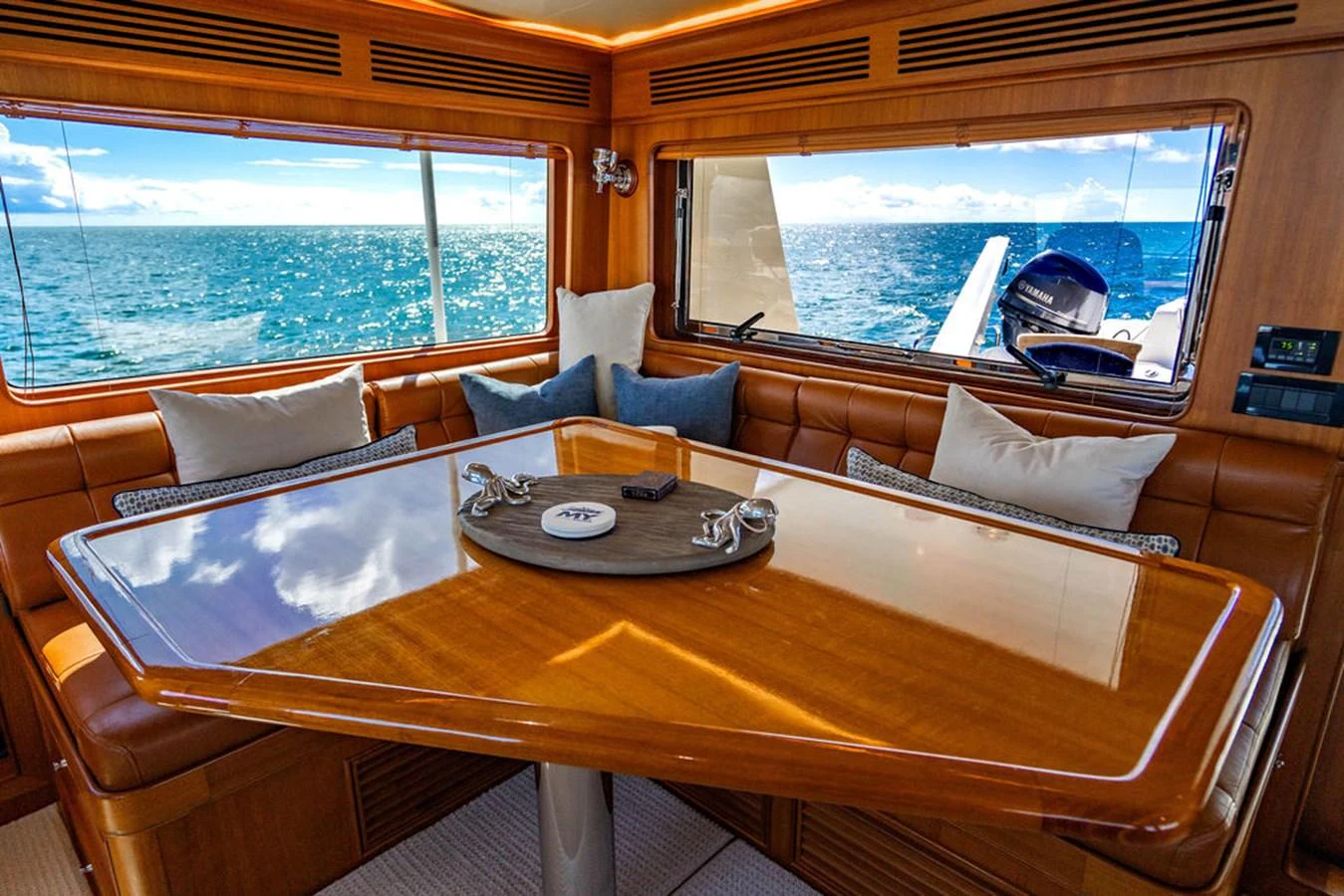 a living room with a large window aboard NEVER BETTER Yacht for Sale