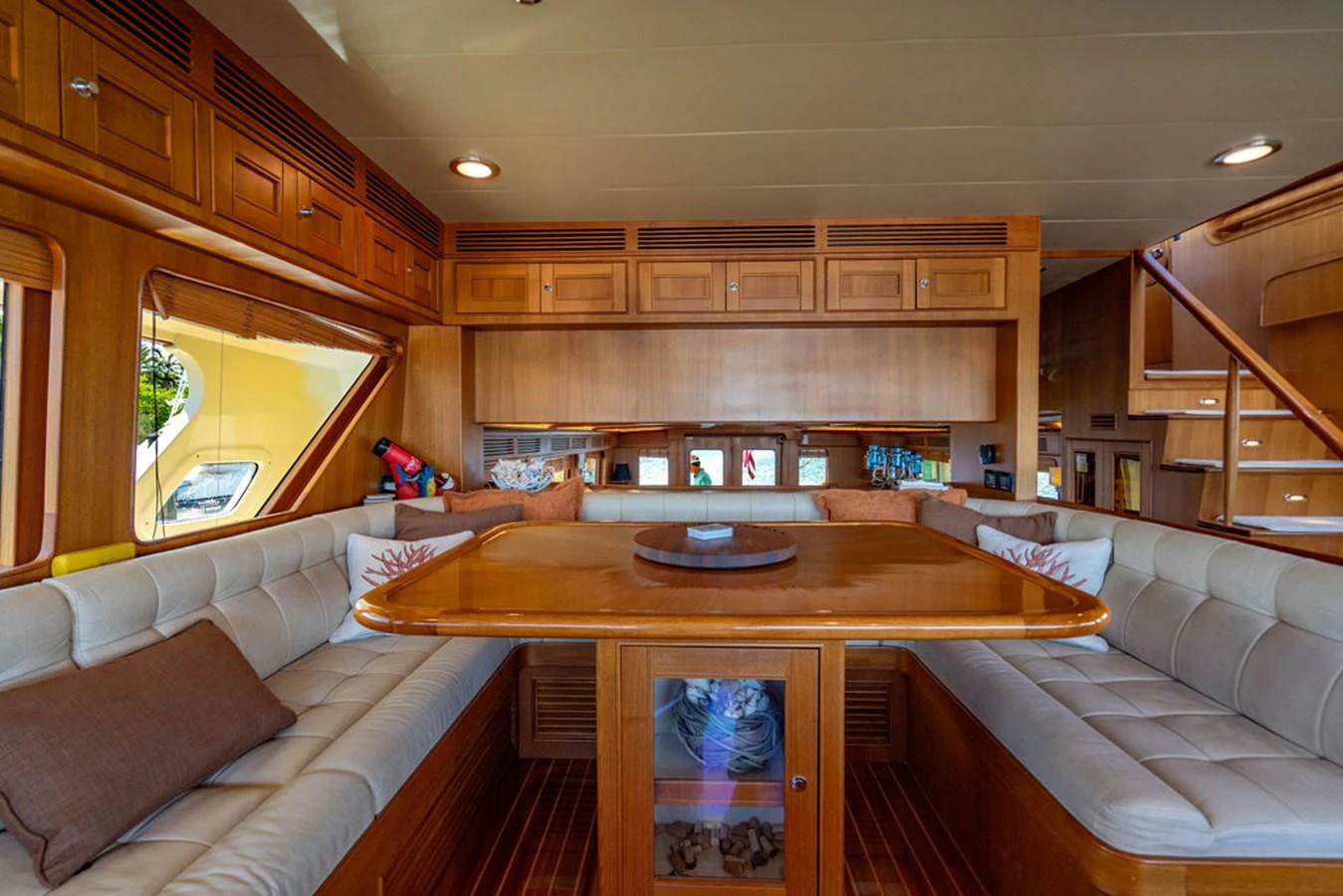 a living room with a couch and a table aboard NEVER BETTER Yacht for Sale