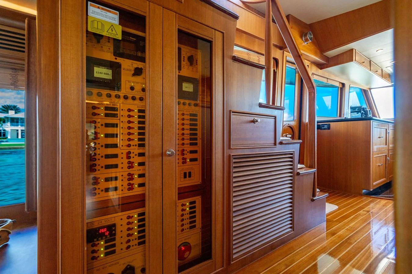 a room with a wood door and a wood floor aboard NEVER BETTER Yacht for Sale