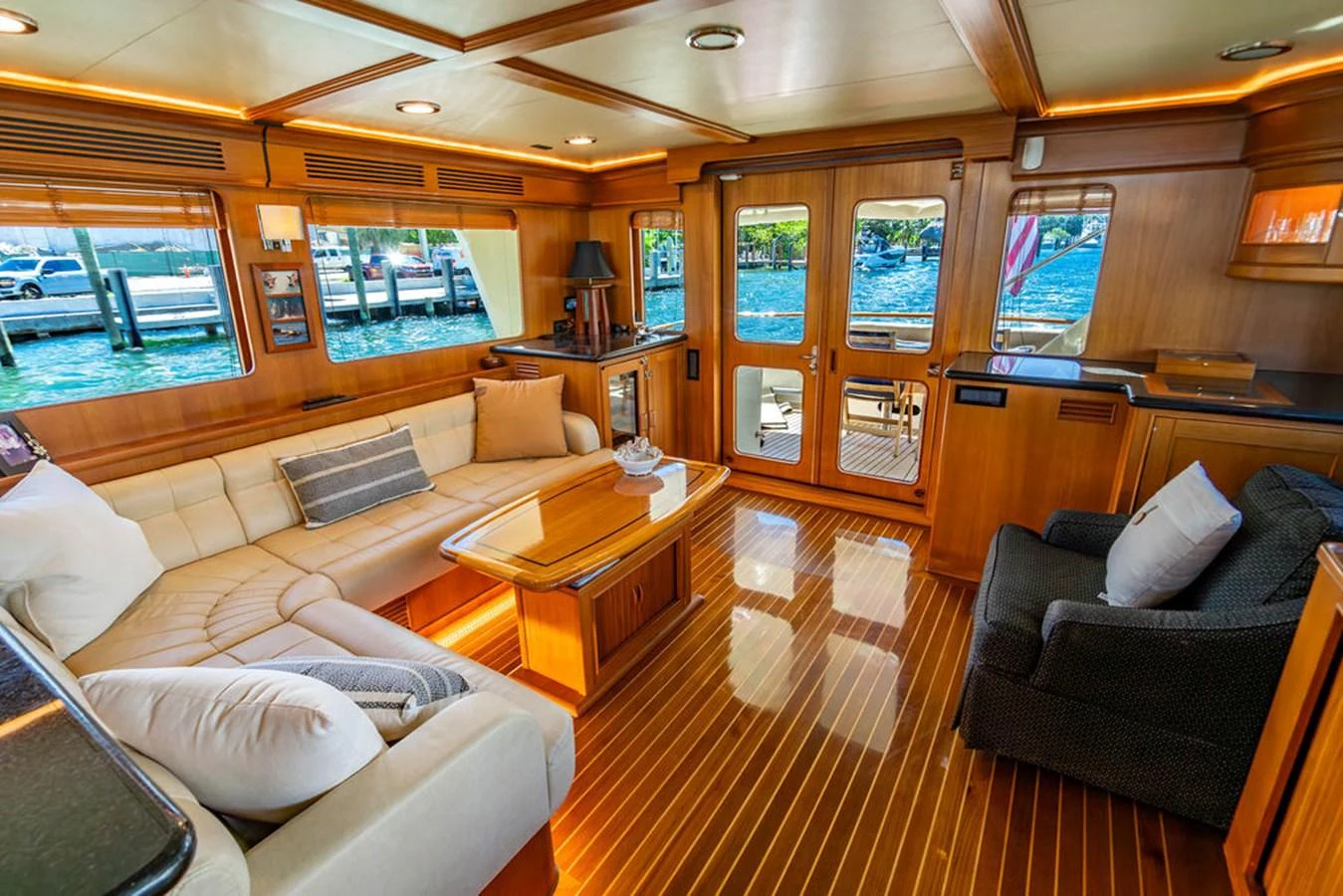 a living room with leather couches aboard NEVER BETTER Yacht for Sale