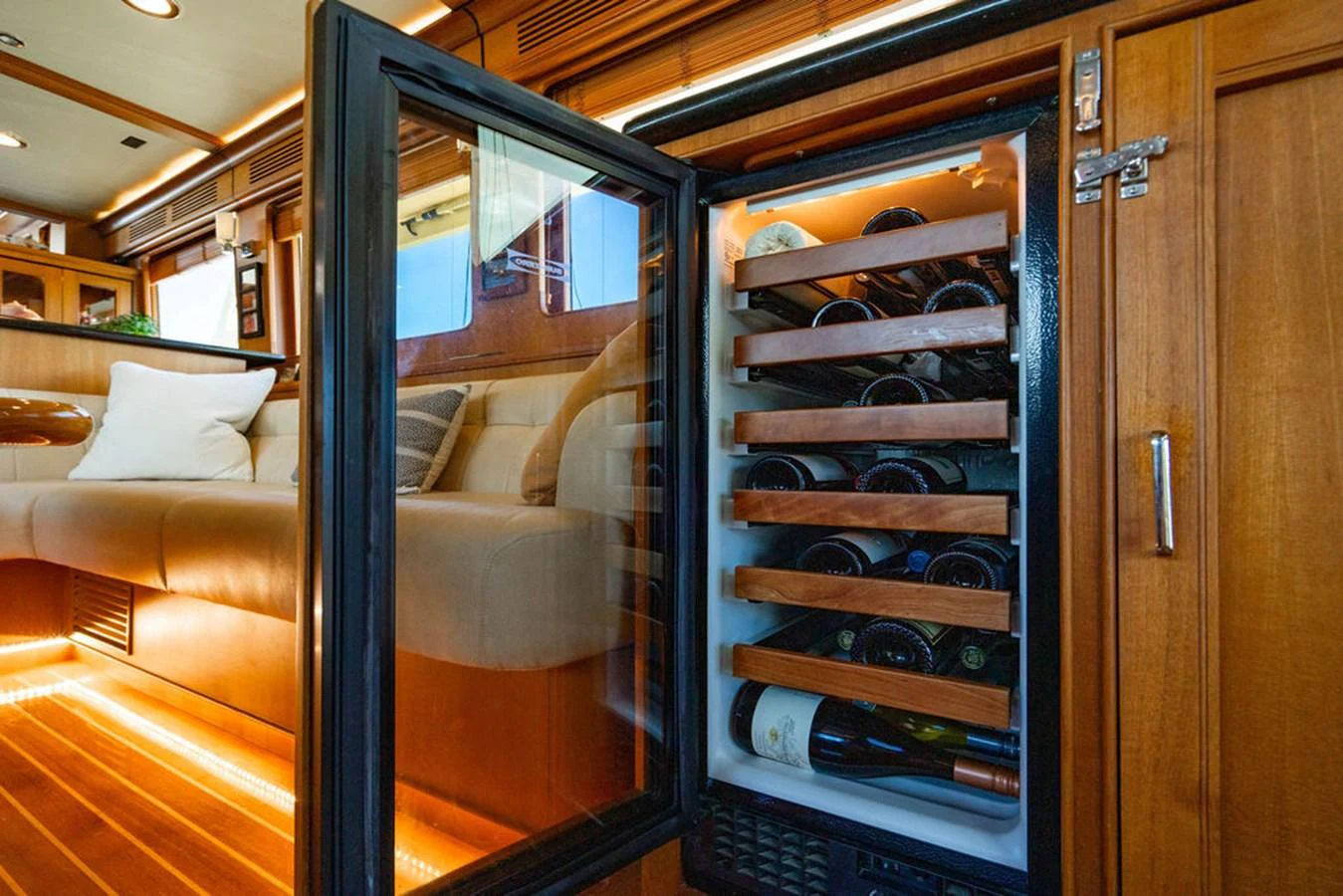 a glass cabinet with a door aboard NEVER BETTER Yacht for Sale