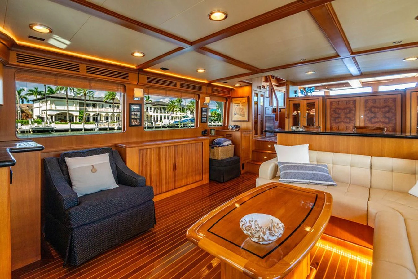 a living room with a couch and a coffee table aboard NEVER BETTER Yacht for Sale