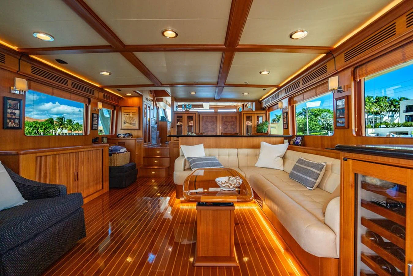 a living room with a wood floor aboard NEVER BETTER Yacht for Sale