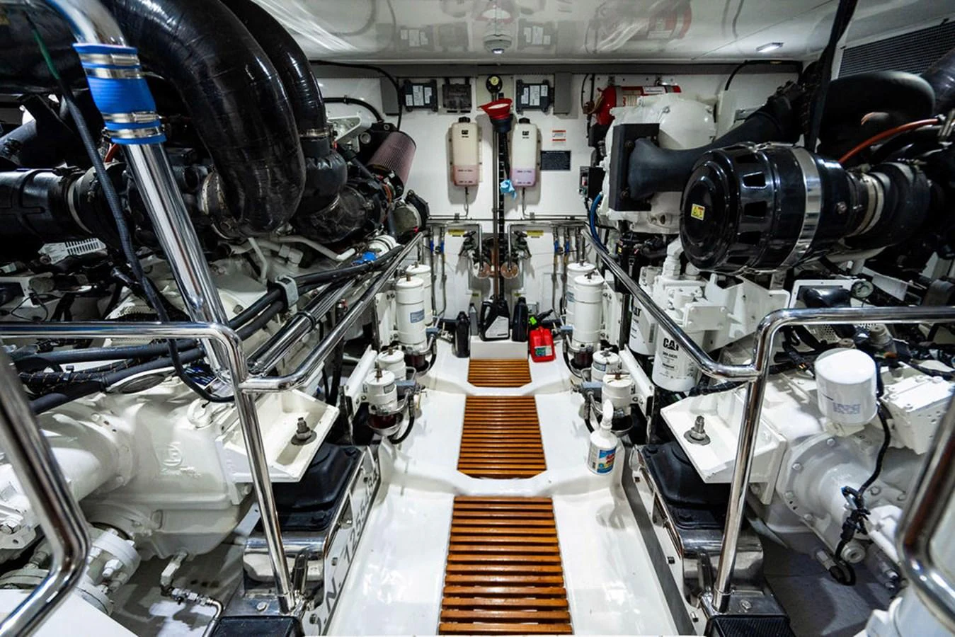 a close-up of a car engine aboard NEVER BETTER Yacht for Sale